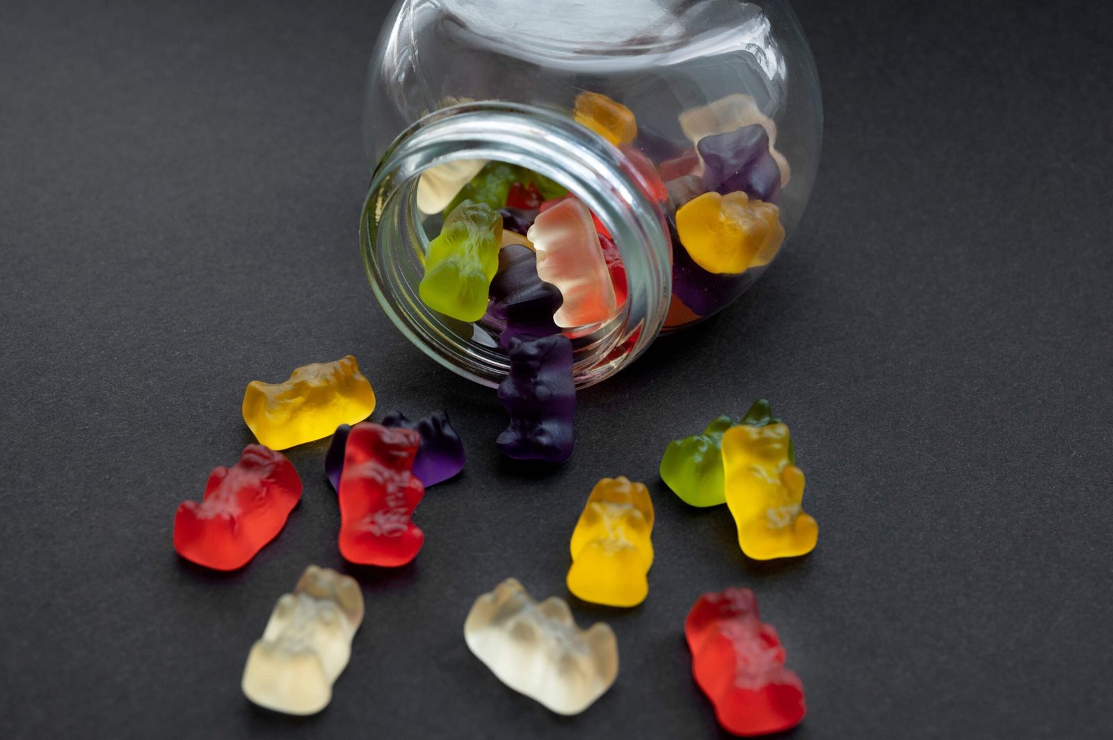 assortment delicious gummy bears with glass jar scaled
